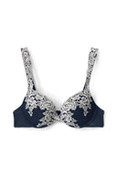 White and navy lace push-up bra with underwire cups and white lace straps, product shot, front