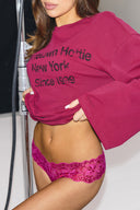Raspberry rose (deep pink) multitone lace low-waist hipsters with scalloped waistband, side view on model