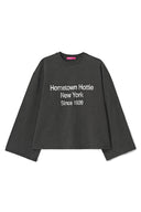 Washed black crew neck top with wide long sleeves and text print, product shot, front